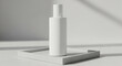 © Aiustock - Minimalist White Cosmetic Bottle on Tray with Soft Shadows