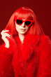 © Andrey Kiselev - bright red hair and fur coat