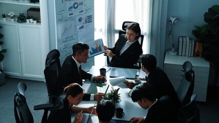 Poster - Top view of smart business woman show increasing sales chart to diverse team while group of diverse business people listening and analyzing stock investment data at table with document. Directorate.
