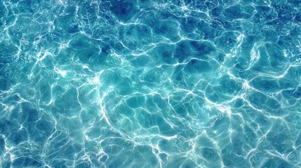 Poster - Sunlight reflects off the clear blue water, creating gentle ripples. The scene captures a serene and refreshing atmosphere ideal for relaxation and rejuvenation by the water.
