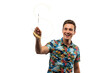 © AuroraCrafts - Happy man in Hawaiian shirt writing with a sparkler light trail