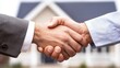 © Iaroslav - Business partners shaking hands after successfully closing a deal on a new home purchase, celebrating their collaboration and trust