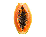 Vibrant halved papaya with black seeds against a stark black background