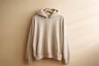 © dar - Beige hoodie on wooden hanger