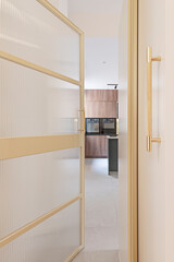 Poster - Modern culinary ambiance: gray cabinetry, marble countertops, and stainless steel accents for a sleek look