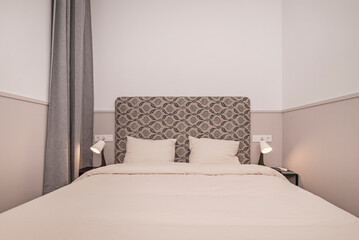Poster - Classic comfort: Bedroom with a double bed, antique furniture, and cotton bedding
