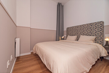 Poster - Industrial style: Bedroom with a king-size bed, brick walls, and metal lamps