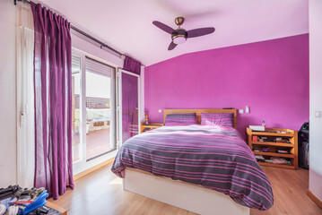 Poster - Relaxation corner: A room with a double bed, soft lighting, and inspiring decor.