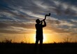© 5 Grace Media - Silhouette of a man blowing a shofar against a vibrant sunset sky