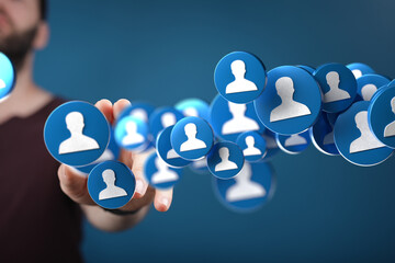 Poster - Image depicts a person connecting with many online profiles, representing social media and networking.