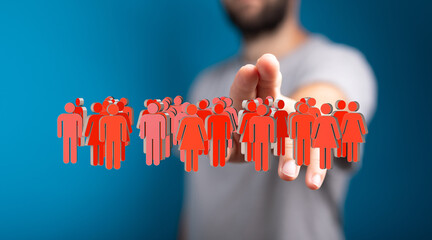 Poster - Image depicts a hand interacting with a diverse group of people, symbolizing global connection and community.