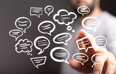 Poster - Abstract image of a hand interacting with speech bubbles, representing communication, ideas, and collaboration.