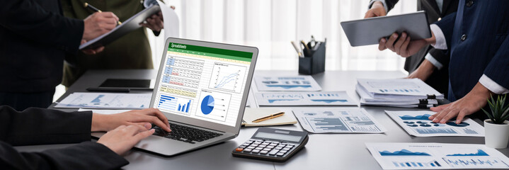 Poster - Panorama shot analyst team utilizing BI Fintech to analyze financial report with laptop. Businesspeople analyzing BI data dashboard displayed on laptop screen for business insight. Prodigy