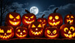 © Vera - Halloween pumpkins glowing under full moon at night