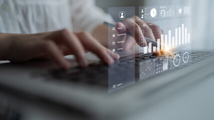 Poster - Close-up view of hands typing on a laptop with digital graphs and analytics on the screen, showcasing modern business performance and data analysis. Impute