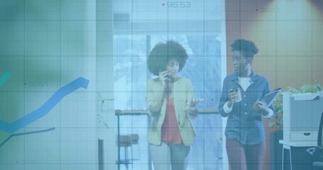 Poster - Two colleagues walking corridor with phone and tablet causing graphs illustrating business trends