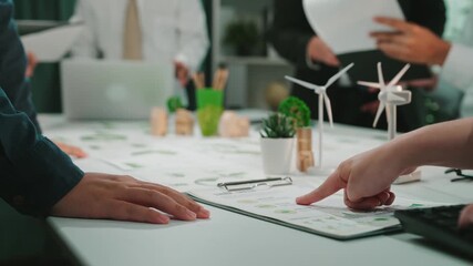 Poster - A group of business professionals engaging in a collaborative meeting in a modern office. They discuss strategies while interacting with documents and digital devices. SACTR
