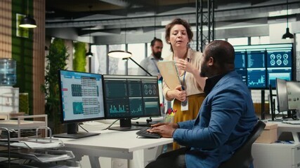 Poster - Multiethnic work team consulting each other in completing monthly reports, reviewing KPI data insights for business productivity. Collaboration between employees for success. Camera A.
