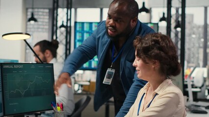 Poster - Diverse office coworkers reviewing monthly data graphs to create reports, applying business strategy and analysis to drive innovation and improve company performance. Work alliance. Camera B.