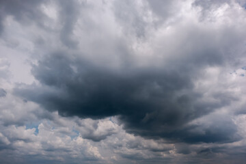 Wall Mural - dark sky with stormy clouds. dramatic sky rain,dark clouds before a thunder-storm,clouds before rain