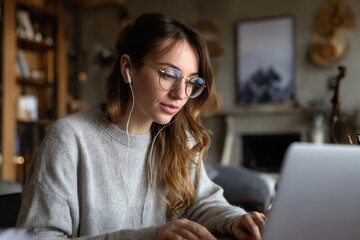 Aufkleber - Woman participates in productive video conference while working from home in a cozy living room setting