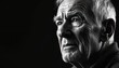 © Maryna - Monochrome portrait captures elderly man face in dramatic detail. Deep wrinkles, expressive eyes convey wisdom, contemplation. Sharp contrast lighting shapes mature features against dark background,