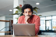 © BusinessClass by W61 - Businessman working on laptop at desk in office