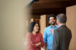 © BusinessClass by W61 - Happy multiracial colleagues discussing in office
