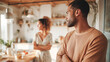 © aMichelle - Couple standing in kitchen during relationship argument