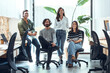 © BusinessClass by W61 - Confident multiracial businessmen and businesswomen in coworking office