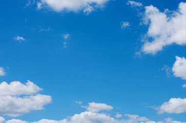 Wall Mural - blue sky background with white clouds
