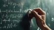 © Stock Medae  - Hand writing complex mathematical equations on a green chalkboard