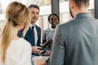 © BusinessClass by W61 - Coworkers having business meeting in office