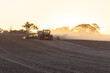 © Austockphoto - Tractor ploughing soil with airseeder planting wheat in a paddock