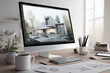 © Olena - Architect's workspace featuring a computer displaying a modern house design rendering and creative tools.