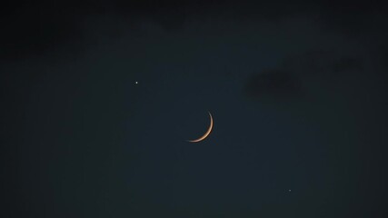 Wall Mural - crescent young moon with stars, planets and some clouds.
