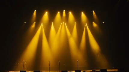 Wall Mural - dramatic stage lighting with yellow spotlights and haze.