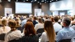 © Iaroslav - Professionals networking, listening intently to keynote speaker sharing knowledge in crowded conference hall with collaborative energy