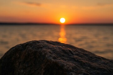 Wall Mural - A Serene Oceanic Sunset Over a Rugged Coastline