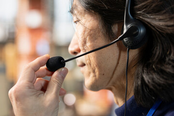 Poster - Call center agent talking in headset mic, providing step by step guidance to customer. Customer center employee speaking in headphones microphone, walking clients through technical solutions, closeup