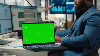 Poster - Professional manager works with graphs and isolated mockup screen, ensuring business success for the international market. Reviewing data for a global expansion strategy in office. Camera B.