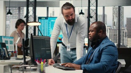 Poster - Administrator and assistant gather data from monthly reports, reviewing performance metrics and creating graphs that align with project goals. Teamwork for innovation and achievement. Camera B.