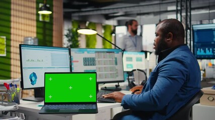 Poster - Professional manager works with graphs and isolated mockup screen, ensuring business success for the international market. Reviewing data for a global expansion strategy in office. Camera A.