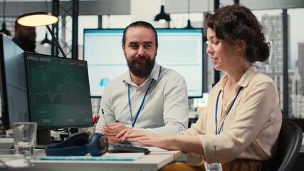 Poster - Corporate manager and assistant collaborating on a new expansion vision, ensuring a synergy between enterprise goals and performance metrics. Collaborative insights for a project. Camera B.