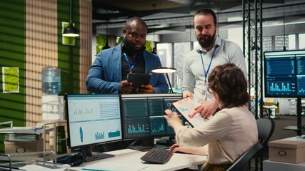 Poster - Multiethnic work team consulting each other in completing monthly reports, reviewing KPI data insights for business productivity. Collaboration between employees for success. Camera A.