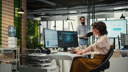 Poster - Office administrator checking monthly reports with AI analytics platform, employing neural networks algorithms and automation for efficiency. IT company representative at work. Camera A.