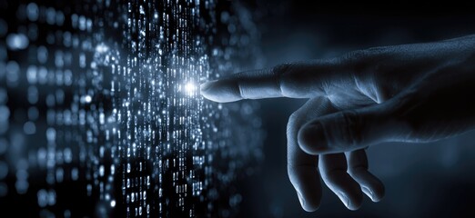 A hand touching digital code