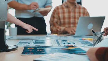 Poster - A diverse team collaborates in a bright office space, focusing on digital tools and business data. Individuals engage in brainstorming, showcasing modern teamwork dynamics. SACTR