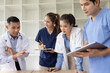 © SOMKID - Medical team brainstorming having a meeting in conference room at hospital, Medical technology and health care concept.