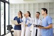 © SOMKID - Medical team brainstorming having a meeting in conference room at hospital, Medical technology and health care concept.
